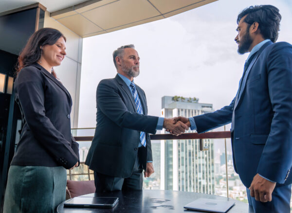 Chief executive officer with secretary meet up with business man at the rooftop balcony discuss on business investment